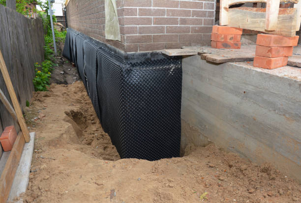 Happy homeowners after waterproofing job in Carversville